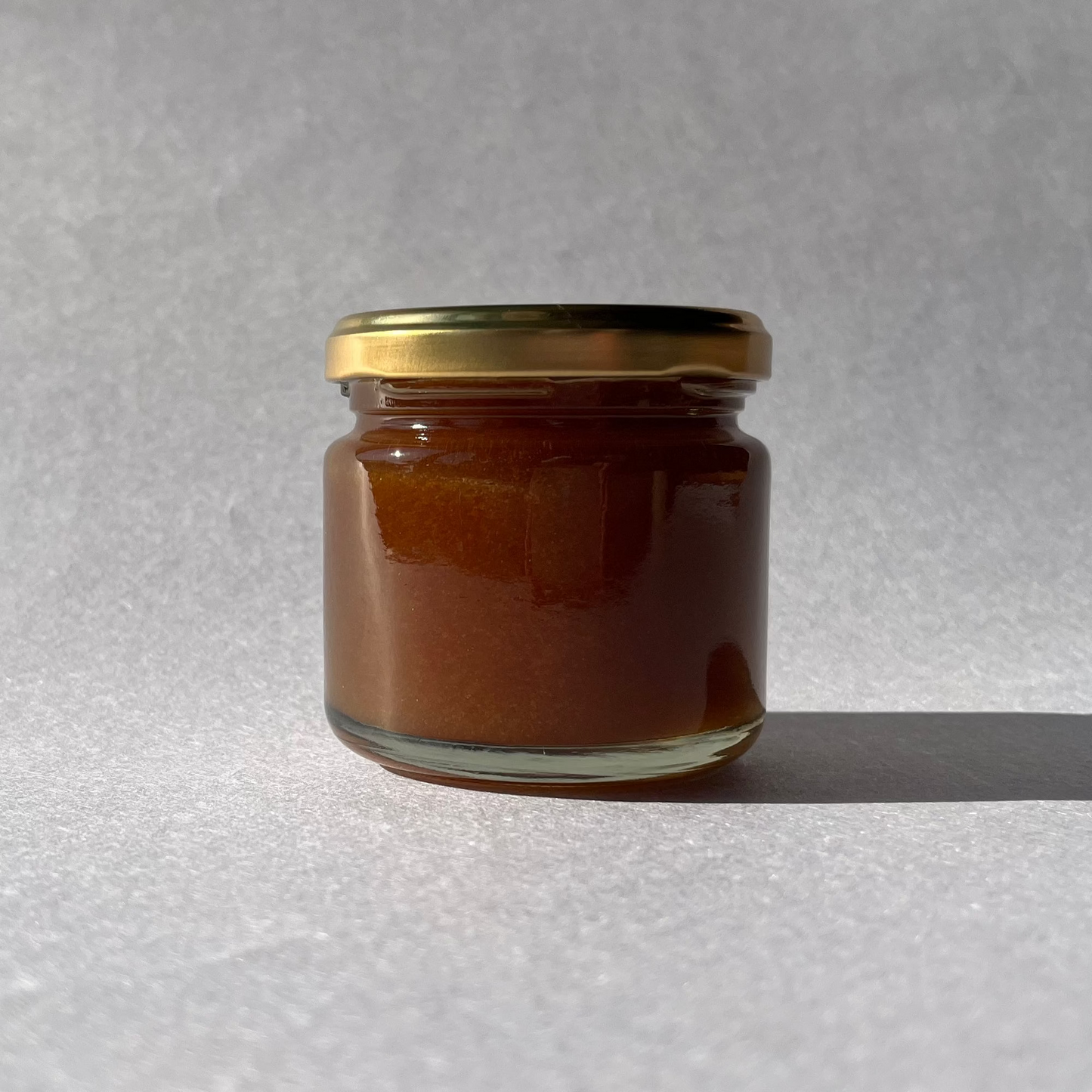 ニホンミツバチの生蜂蜜・深茶色・結晶蜜（ガラス瓶 140g）