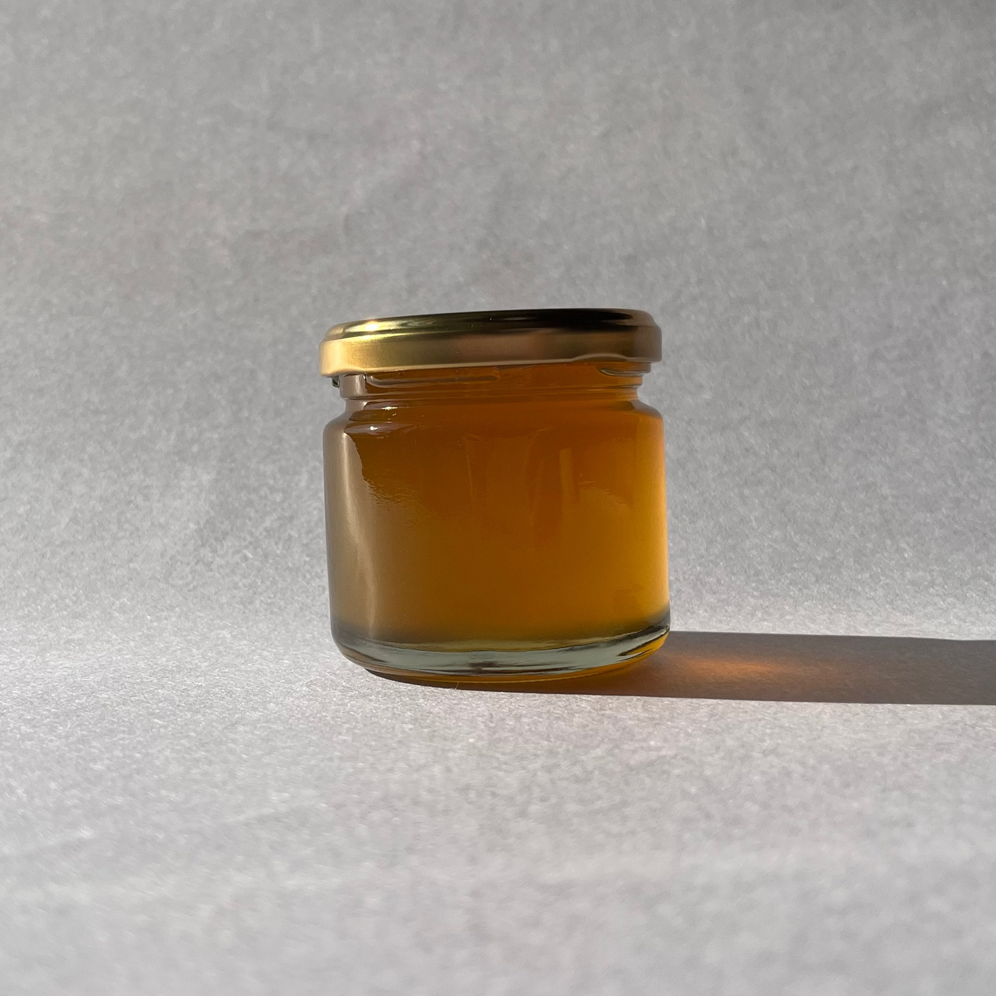 ニホンミツバチの生蜂蜜・黄金色（ガラス瓶 140g）